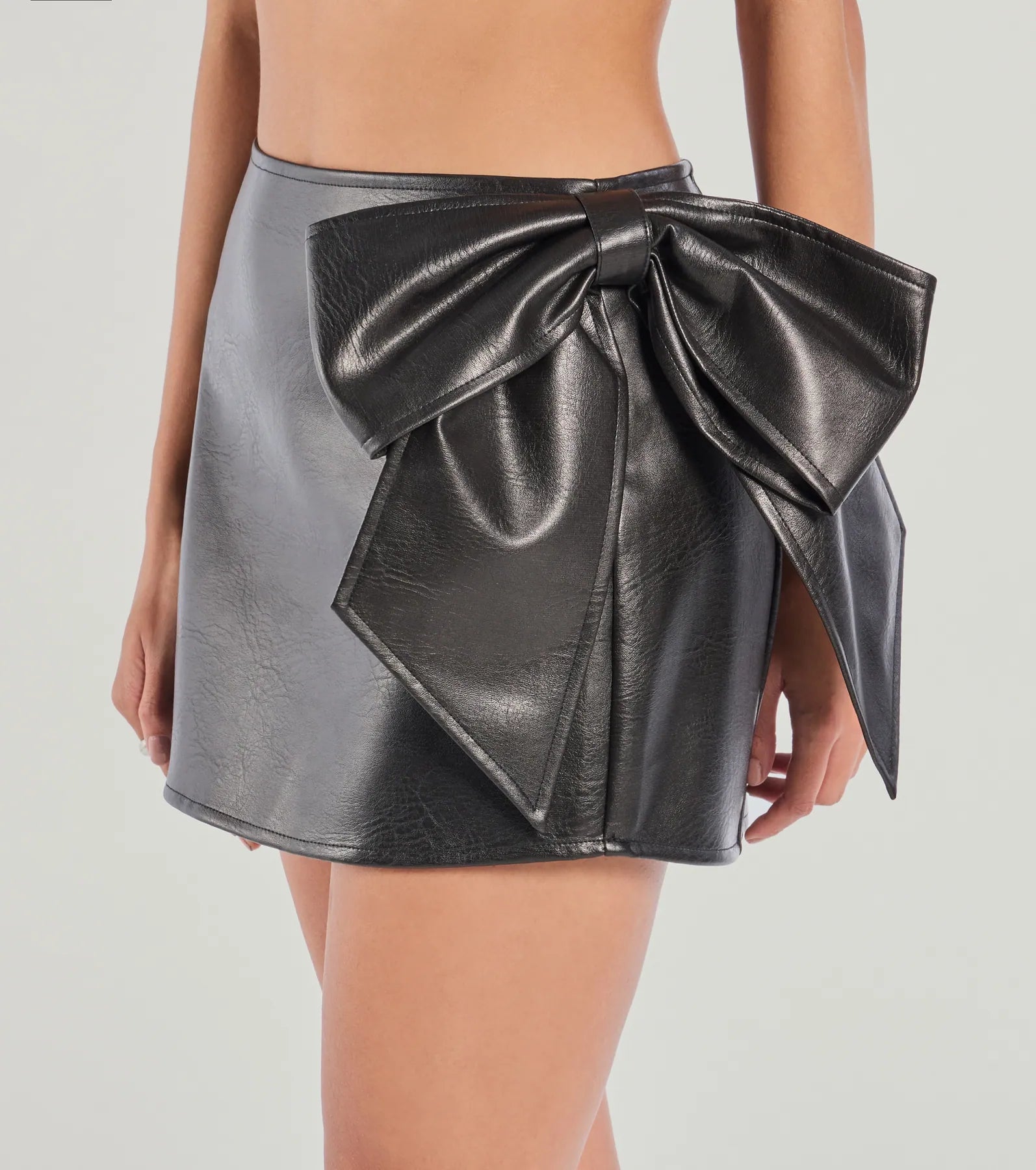 Ultimate Statement Bow Faux Leather Mini Skirt - Premium Fit & Style